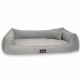 Graues Haustierbett mit erhöhten Rändern und einem kleinen Kissen, mit einem schwarzen Etikett mit dem Markennamen "tierlando."