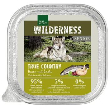 Verpackung für Nassfutter mit einem Wolf, beschriftet "WILDERNESS SENIOR," mit 95% Huhn und Lachs, 5% Früchte und Gemüse, ohne Getreide.