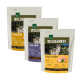 Drei Beutel von Real Nature's "Wilderness" Hundefutter: Pure Ente, Pure Lamm und Pure Huhn, die 65% Fleisch und Wolf-Bilder zeigen.