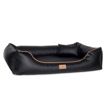 Schwarzes Haustierbett mit orangefarbenen Nähten und einem kleinen passenden Kissen, mit einem Holzschild beschriftet "terranza."