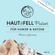 Haut & Fell Pulver für Hunde und Katzen, mit einem Mops und einer schlafenden getigerten Katze, mit "Made in Germany" und 120g Etikett.
