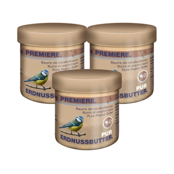 Drei Gläser reiner Erdnussbutter mit der Aufschrift "Erdnussbutter" und einer Illustration eines Blaumeise, mit Text in mehreren Sprachen.