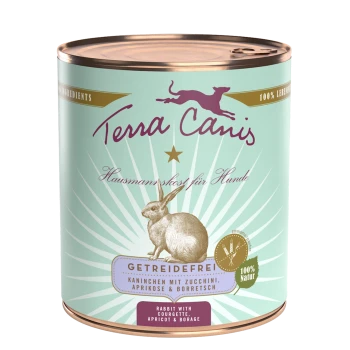 Eine Dose Terra Canis Hundefutter mit einer Illustration von einem Kaninchen, beschriftet "Getreidefrei" und enthält Kaninchen, Zucchini, Aprikose und Borretsch.