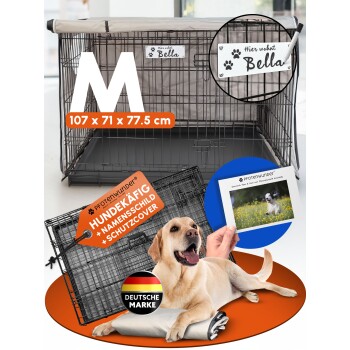 Schwarzer Metall-Haustierkäfig auf Gras mit einem Maßband, das etwa 110 cm Länge zeigt, und angebrachtem Anleitungspapier.