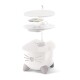 Un distributeur de nourriture pour animaux de compagnie en forme de chat blanc avec des pattes grises, présentant un dessus amovible et des compartiments pour le stockage des aliments.