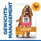 Hill's Science Plan Light Hundefutterbeutel mit einem glücklichen braunen Hund, beschriftet mit "Gewichtsmanagement" und "mit Huhn."