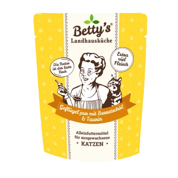 Gelbe Katzennassfutter-Tüte 'Betty's Landhausküche' mit Frau-und-Katze-Illustration; sichtbarer Text: 'Geflügel pur mit Taurin' und 'Alleinfuttermittel für ausgewachsene KATZEN'