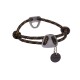 Ein schwarz-gelbes geflochtenes Hundehalsband mit einem Metallverschluss und einem Anhänger, auf dem der Markenname 'RUFFWEAR' deutlich angezeigt wird.