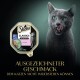 Sheba Classics Lachs Katzenfutterpaste mit einer grauen Katze, die sich die Lippen leckt, und dem Text: "AUSGEZEICHNETER GESCHMACK DEM KATZEN NICHT WIDERSTEHEN KÖNNEN."