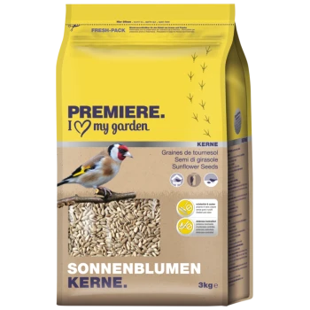 Een zak van 3 kg zonnebloempitten voor vogels, met een puttertje op een tak, met de tekst 'PREMIERE. I ♥ my garden' en 'SONNENBLUMEN KERNE.'