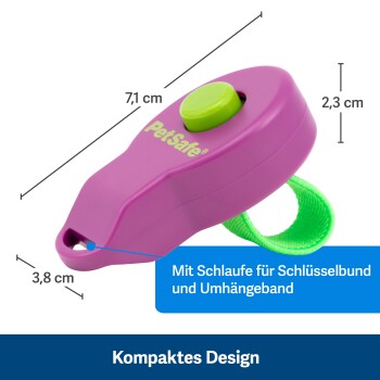 Lila PetSafe-Klicker mit grünem Knopf und einer Schlaufe zur Befestigung, Abmessungen 7,1 cm x 3,8 cm x 2,3 cm, beschriftet "Kompaktes Design."