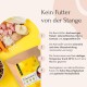 Rohzutaten einschließlich Fleisch, Reis, Karotten und Apfelscheiben mit einer Tüte Paw Petfood Kaninchen-Geschmack und deutschem Text über Qualitätszutaten.