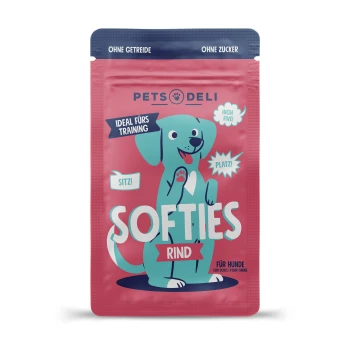 Adult Snack Softies Rind 90g Bunte Verpackung für "Softies Rind" Hundeleckerlis mit einem Cartoon-Hund und dem Text: "Ideal fürs Training," "Sitz!," "High Five!," "Platz!"