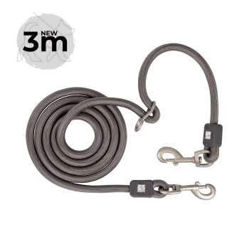 Aufgerollte graue geflochtene 3 m Hundeleine mit zwei Metallkarabinern, Schlaufenhandgriff und Abzeichen 'NEW 3m'.