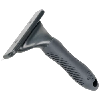 A black pet grooming tool with a flat scraping blade and a textured ergonomic handle, designed for removing loose fur.