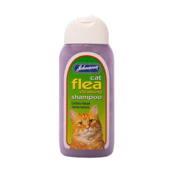 Johnson's cat flea cleansing shampoo bottle, featuring a purple design and an image of an orange cat, labeled with "Contains Natural Herbal Extracts."