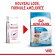 Deux sacs de nourriture pour chiens : Royal Canin Pediatric Junior à gauche, Royal Canin Puppy pour les races moyennes à droite, étiquetés "NOUVEAU LOOK."