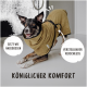 Ein glücklicher Hund in einem braunen Handtuchmantel mit verstellbaren Riemen, mit dem Text: "Sitzt wie angegossen," "Verstellbarer Verschluss," "Königlicher Komfort."