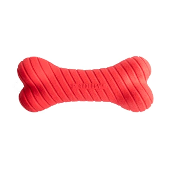 Jouet en caoutchouc rouge pour chien en forme d'os, avec une texture nervurée et le logo en relief "PLAYOLOGY™".