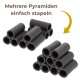 Schwarze keramische Rohr-Biofilterstücke, zu Pyramiden gestapelt; Text: 'Mehrere Pyramiden einfach stapeln' und ein gelber Pfeil.