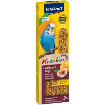 Opakowanie przysmaku dla ptaków Vitakraft Kräcker z niebieskim papużkiem, z napisem 'Morela & Figa', witaminami i bez dodatku cukru.