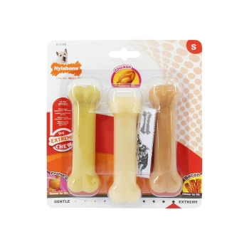 Three Nylabone chew toys in a pack: Peanut Butter, Chicken, and Bacon flavors, labeled "Extra Durable" and "Extreme Chew."