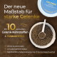 Ein blauer Behälter mit der Aufschrift "PFERDEGOLD" mit "Ergänzungsfuttermittel für Pferde," enthält Hagebutten, Leinsamen und orangefarbene Tabletten.