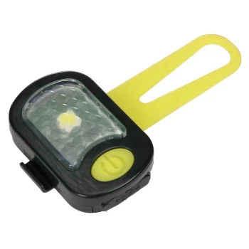 Schwarz-gelbes Haustiersicherheitslicht mit einem diamantmusternden Objektiv und einer gelben Befestigungsschlaufe, mit einem Einschaltknopf.