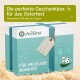 Geschenkbox für Haustiere von AniForte, beschriftet mit "Die perfekte Geschenkbox für das Osterfest" und "Für wedelnde Momente", mit einem Tag zur Personalisierung.