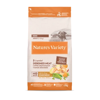 Sac de croquettes Nature's Variety Mini Adult — viande désossée, sans céréales, poulet élevé en plein air, 1,5 kg, photo d'un chien