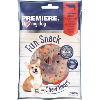 Ein lächelnder Corgi sitzt neben einem Paket "Premiere I ♥ my dog Fun Snack Chew Heart", das ein Rinderhaut-Leckerli in Herzform zeigt.
