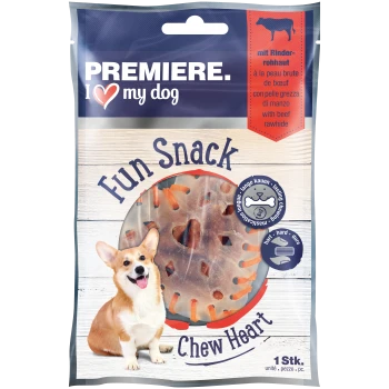 Ein lächelnder Corgi sitzt neben einem Paket "Premiere I ♥ my dog Fun Snack Chew Heart", das ein Rinderhaut-Leckerli in Herzform zeigt.