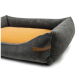 Graues Haustierbett mit einem weichen orangefarbenen Kissen, ausgestattet mit einem Lederschild, auf dem "RexProduct.com" steht.