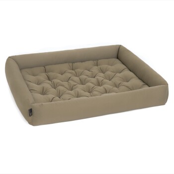 Ein plüschiges, rechteckiges Haustierbett mit gepolstertem Design und erhöhten Rändern in neutralem Beige.