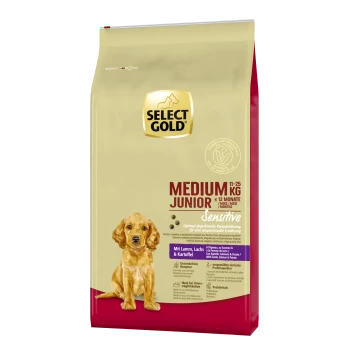 Select Gold Medium Junior dog food bag, 11-25 kg, suitable for dogs up to 12 months, labeled "Sensitive" with lamb, salmon, and potato ingredients.