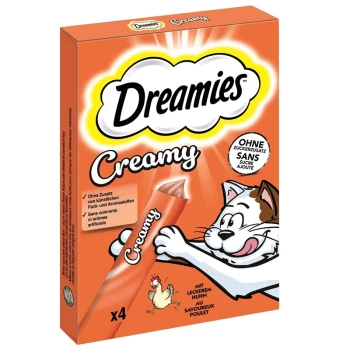 Verpackung für Dreamies Creamy Katzenleckerlis mit einer verspielten Katzenillustration, mit dem Text, der "x4" und "ohne Zuckerzusatz" hervorhebt.