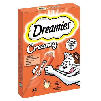 Verpackung für Dreamies Creamy Katzenleckerlis mit einer verspielten Katzenillustration, mit dem Text, der "x4" und "ohne Zuckerzusatz" hervorhebt.