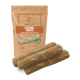 Ein Paket Wildfang Kaffeebaum-Kauestöcke mit drei Holzstäben vor einer braunen Tüte mit der Aufschrift "Kaffeholz Kaustab."