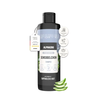 Schwarze Flasche des Alphazoo Sensibelchen Shampoos für empfindliche Haut mit Aloe Vera, deutschem Text und Aloe-Scheiben.