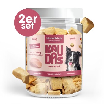 Hundeleckerlis in einem transparenten Glas mit dem Etikett "KAUDAS" mit einem pinken Rand, mit einem Border-Collie-Bild, 80g, Hühnergeschmack, hergestellt in Deutschland.