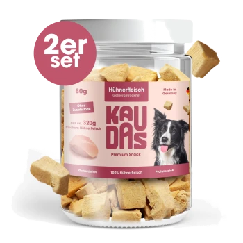 Hundeleckerlis in einem transparenten Glas mit dem Etikett "KAUDAS" mit einem pinken Rand, mit einem Border-Collie-Bild, 80g, Hühnergeschmack, hergestellt in Deutschland.