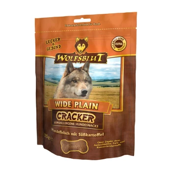 Cracker 225 g Wide Plain Opakowanie przekąsek dla psów Wolfsblut Wide Plain Cracker w kolorze brązowym, w kształcie kości, oznaczone jako hipoalergiczne z mięsem konia i słodkim ziemniakiem.