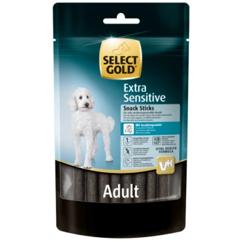 Bâtonnets de collation Extra Sensible Select Gold pour chiens adultes, avec un caniche blanc sur l'emballage, mettant en avant la protéine d'insecte.