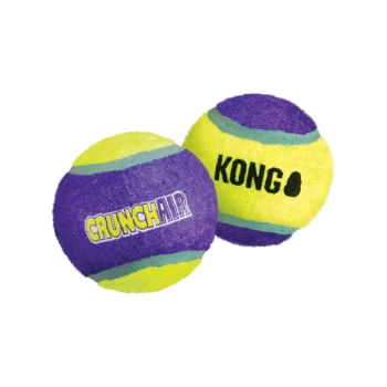 Two colorful dog toys, tennis balls in purple and yellow, labeled "CRUNCHAIR" and "KONG."