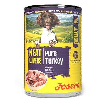 Dose Josera Nassfutter mit der Aufschrift ‚MEAT LOVERS | Pure Turkey‘, mit Hundeporträt, Schüssel mit Putenstücken und Text ‚Erwachsen‘ und ‚Getreidefrei‘.