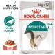 Royal Canin Instinctive 7+ cat food bag, showing a running cat, "Health Nutrition," "Vitality complex," and a bowl of gravy with kibble.