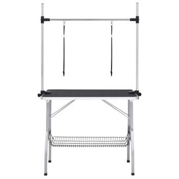 Pflege-Tisch mit schwarzer Oberfläche, verstellbarem Metallrahmen und zwei schwarzen Gurten zur Sicherung von Haustieren, mit einem unteren Drahtregal.