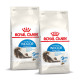 Zwei Tüten Royal Canin Home Life Indoor Langhaarkatzenfutter, mit einem blauen Etikett mit einer Katzenillustration und Text, der die Haarballenreduzierung hervorhebt.