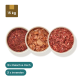 Bild von Tierfutter: drei vakuumverpackte Fleischpakete und drei Schalen mit rohem Futter, beschriftet mit "17x Fleisch," "21x Innereien," und "1x Fisch."