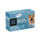 Blaue Schachtel des Pet Stile Dental Petbiotics Hundesupplements mit einem lächelnden Hund und Text, der gesunde Zähne und frische Küsse hervorhebt.